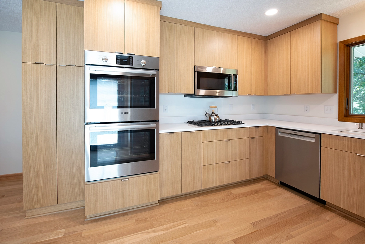 Completed modern kitchen renovation in Big Lake MN featuring rift oak cabinets